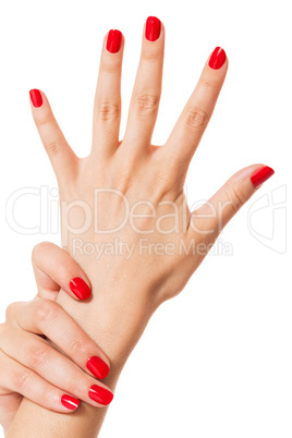 Woman with beautiful manicured red fingernails