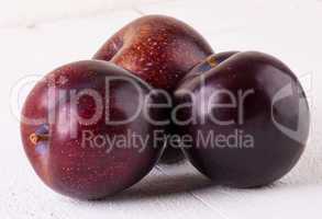 Fresh ripe red plums