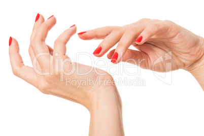 Woman with beautiful manicured red fingernails