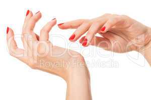 Woman with beautiful manicured red fingernails