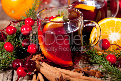 hot tasty spicy mulled red wine with orange and cinnamon christmas