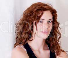 beautiful red head woman with freckle smiling