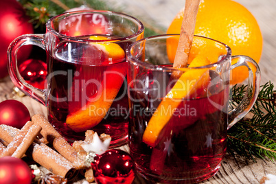 hot tasty spicy mulled red wine with orange and cinnamon christmas