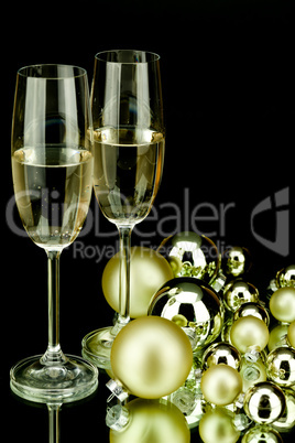 christmas decoration and champagne on black