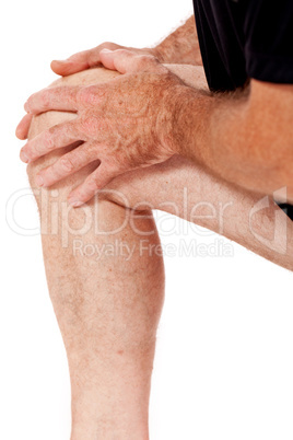 adult attractive man in sportswear knee pain injury ache isolated