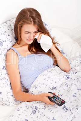 young attractive woman watching movie tv expression