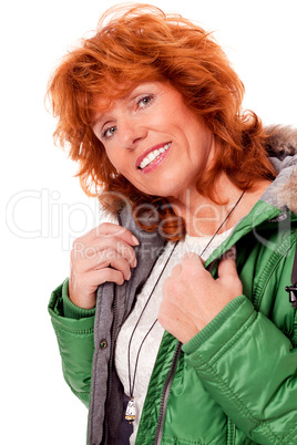 adult redhead woman with winter jacket smiling isolated