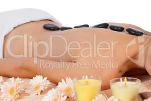 attractive healthy caucasian woman hot stone massage wellness