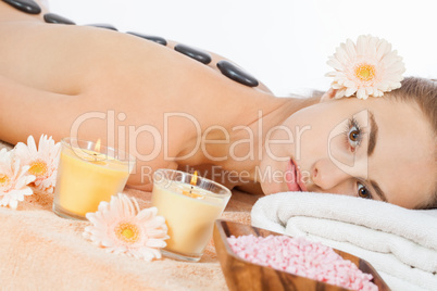 attractive healthy caucasian woman hot stone massage wellness