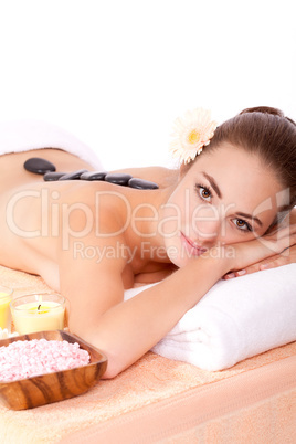 young attractive woman hot stone massage wellness isolated