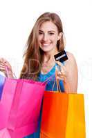 attractive young woman with colorful shopping bags isolated