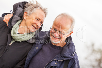 happy mature couple relaxing baltic sea dunes