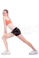 young attractive woman stretching legs after jogging isolated