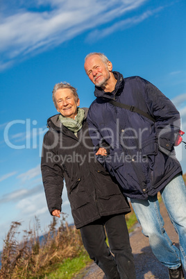 happy mature couple relaxing baltic sea dunes