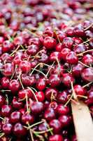 sweet red cherry closeup macro on market outdoor