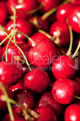 sweet red cherry closeup macro on market outdoor