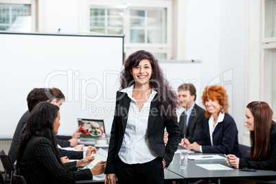 professional successful business woman in office smiling