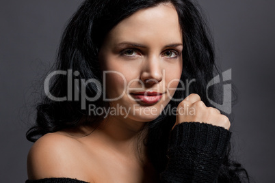 Dark moody portrait of a brunette beauty