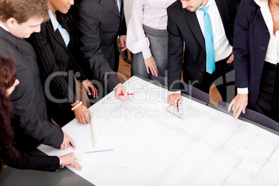 business people discussing architecture plan sketch