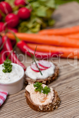 fresh tasty homemade cream cheese and herbs with bread