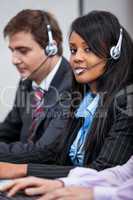 friendly callcenter agent operator with headset telephone