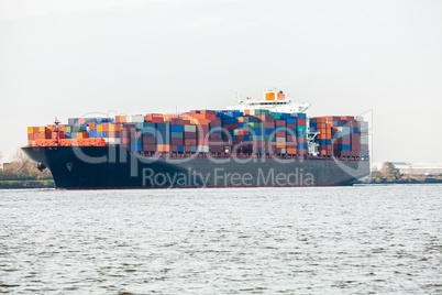 Fully laden container ship in port