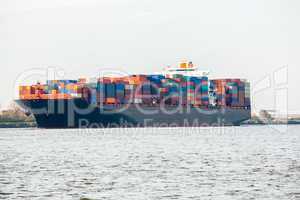 Fully laden container ship in port