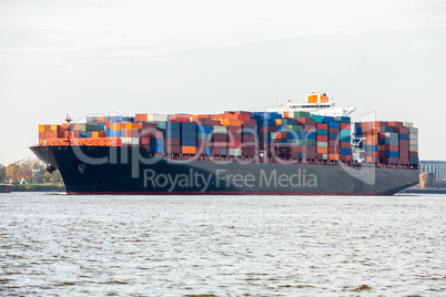 Fully laden container ship in port