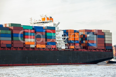 Fully laden container ship in port