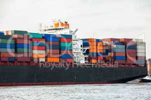 Fully laden container ship in port