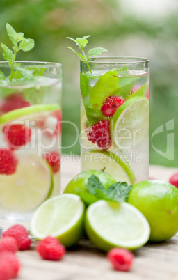 fresh cold drink water ice cubes peppermint lime raspberry