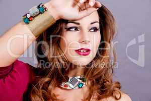 attractive brunette woman with glamour jewellry