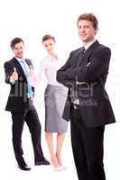 young successful business man in front a group
