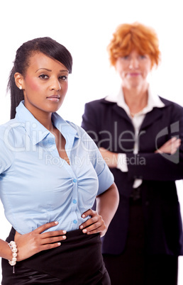 young african business woman with redhead adult woman