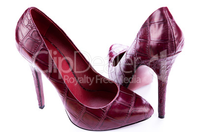 red stylish leather high heels isolated on white