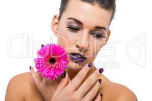 Beautiful woman in purple make-up