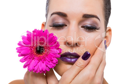 Beautiful woman in purple make-up