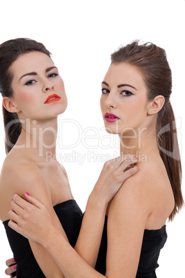 two beautiful girls with colorfull makeup isolated