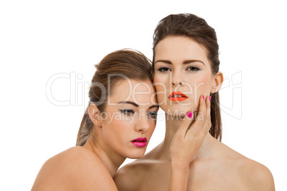 two attractive young woman with colorful lipstick