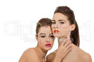 two attractive young woman with colorful lipstick