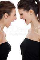 two young girls angry shouting loud isolated