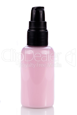 pink plastic bottle of cosmetic cream isolated on white