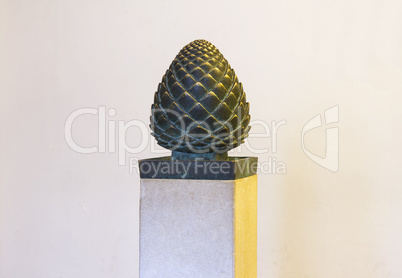 Bronze pine cone .