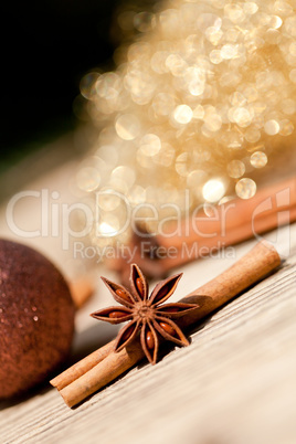 anice cinnamon and bauble christmas decoration in gold