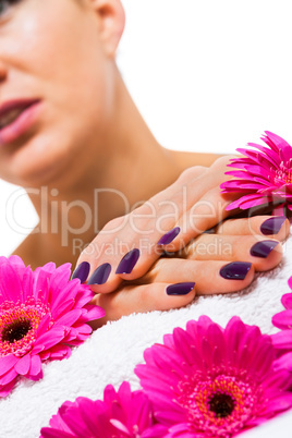 Woman with beautiful manicured purple nails