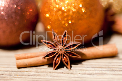 anice cinnamon and bauble christmas decoration in gold