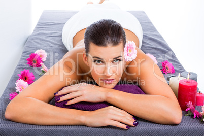 Beautiful woman enjoying a hot stone massage