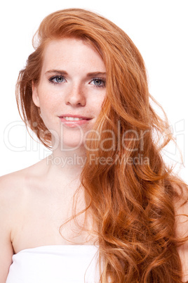 beautiful young smiling woman with red hair and freckles isolated