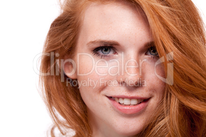 beautiful young smiling woman with red hair and freckles isolated