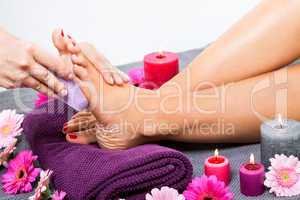 Woman having a pedicure treatment at a spa